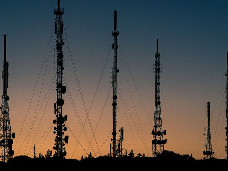Power transmission towers at sunset